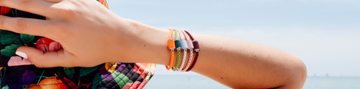 Thalassa magnet bracelets in orange, green, white, pink and brown