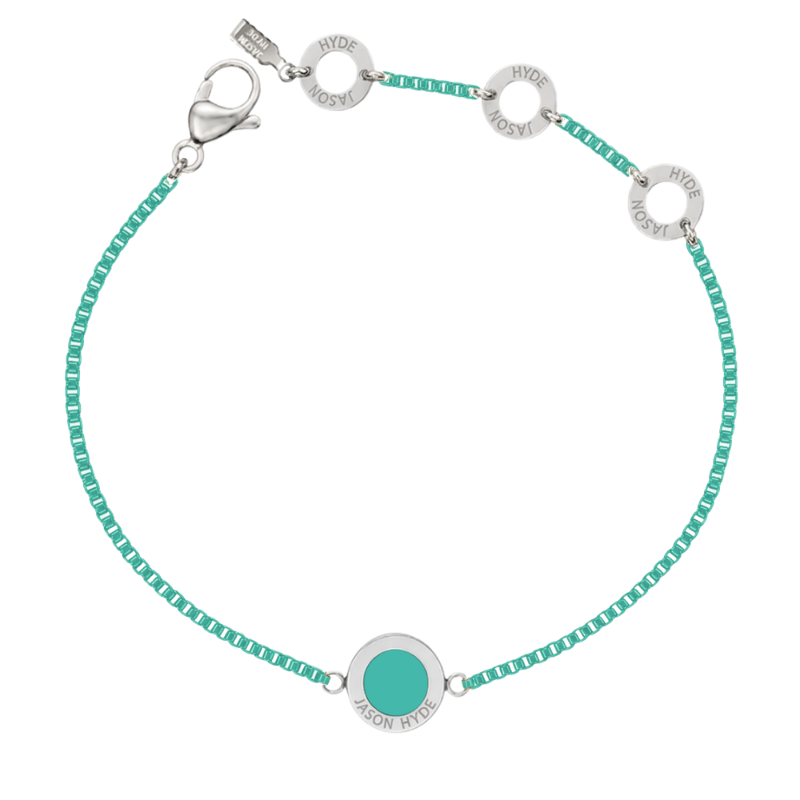 Silver chain bracelet with turquoise beads and a circular turquoise center charm.