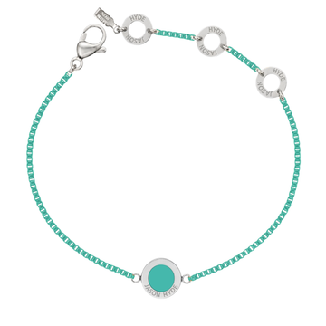 Silver chain bracelet with turquoise beads and a circular turquoise center charm.