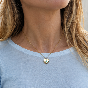 Jason Hyde gold heart pendant necklace with turquoise ocean plastic chip.