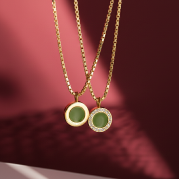 Two gold chain necklaces with round olive green chips